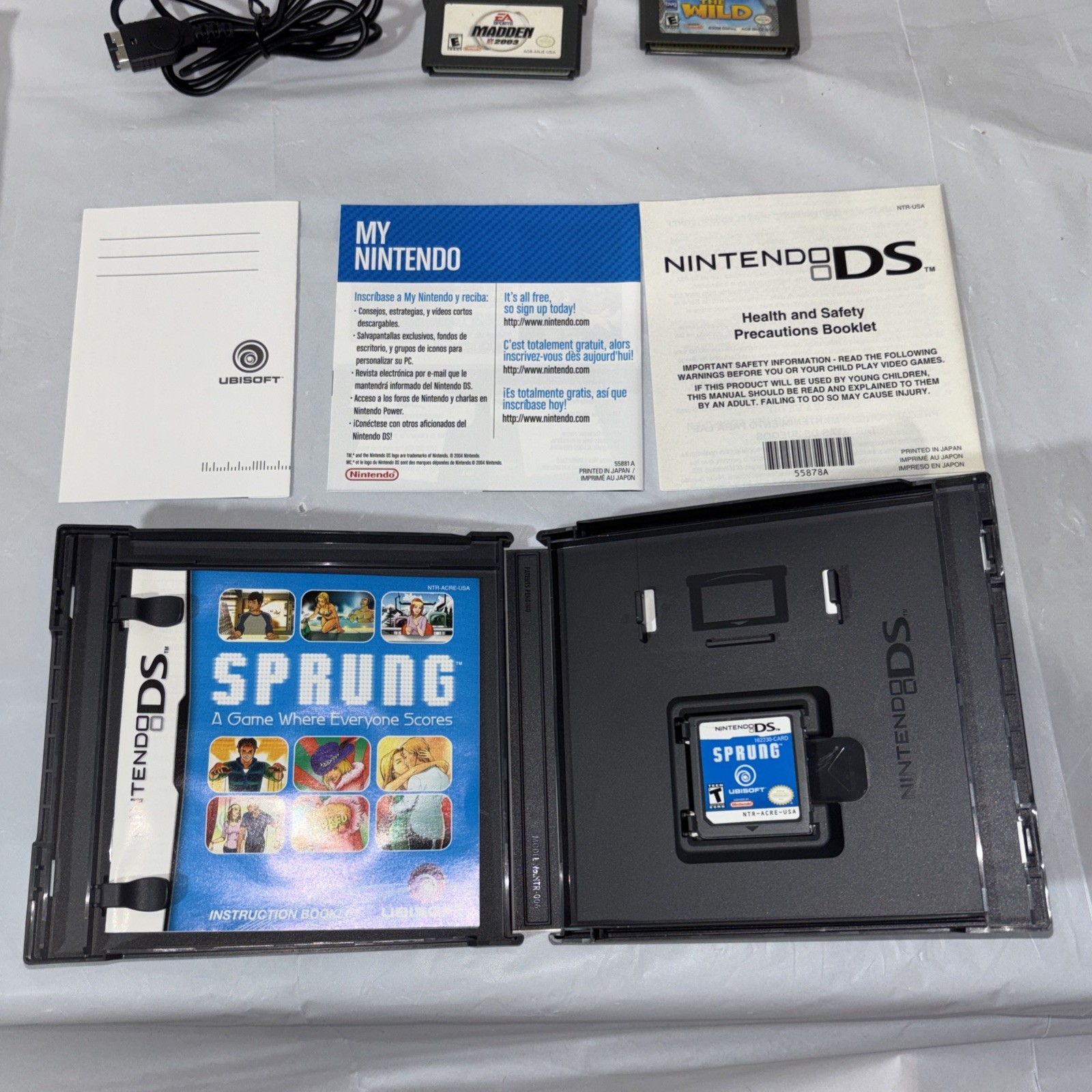 Nintendo DS Silver Handheld System with Wrist Strap + 6 Games Tested and Working