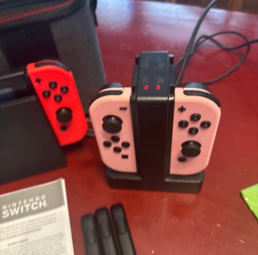 Nintendo Switch 32 GB Handheld Console-Neon Red/Blue/Pink, Controller and Case
