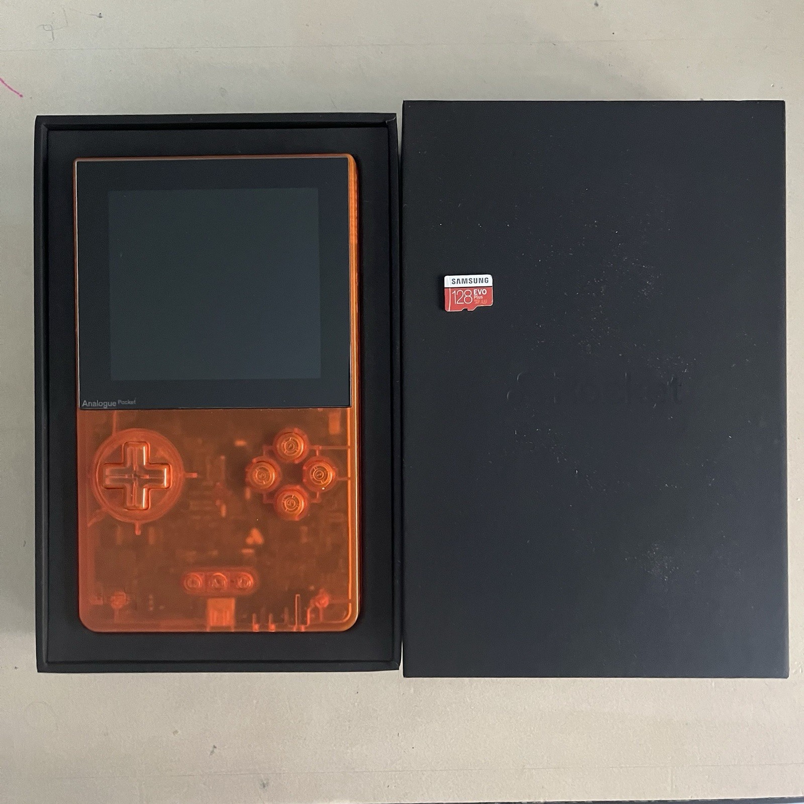 Analogue Pocket Transparent Orange Handheld System W/ 128gb SD Card (Scratched)