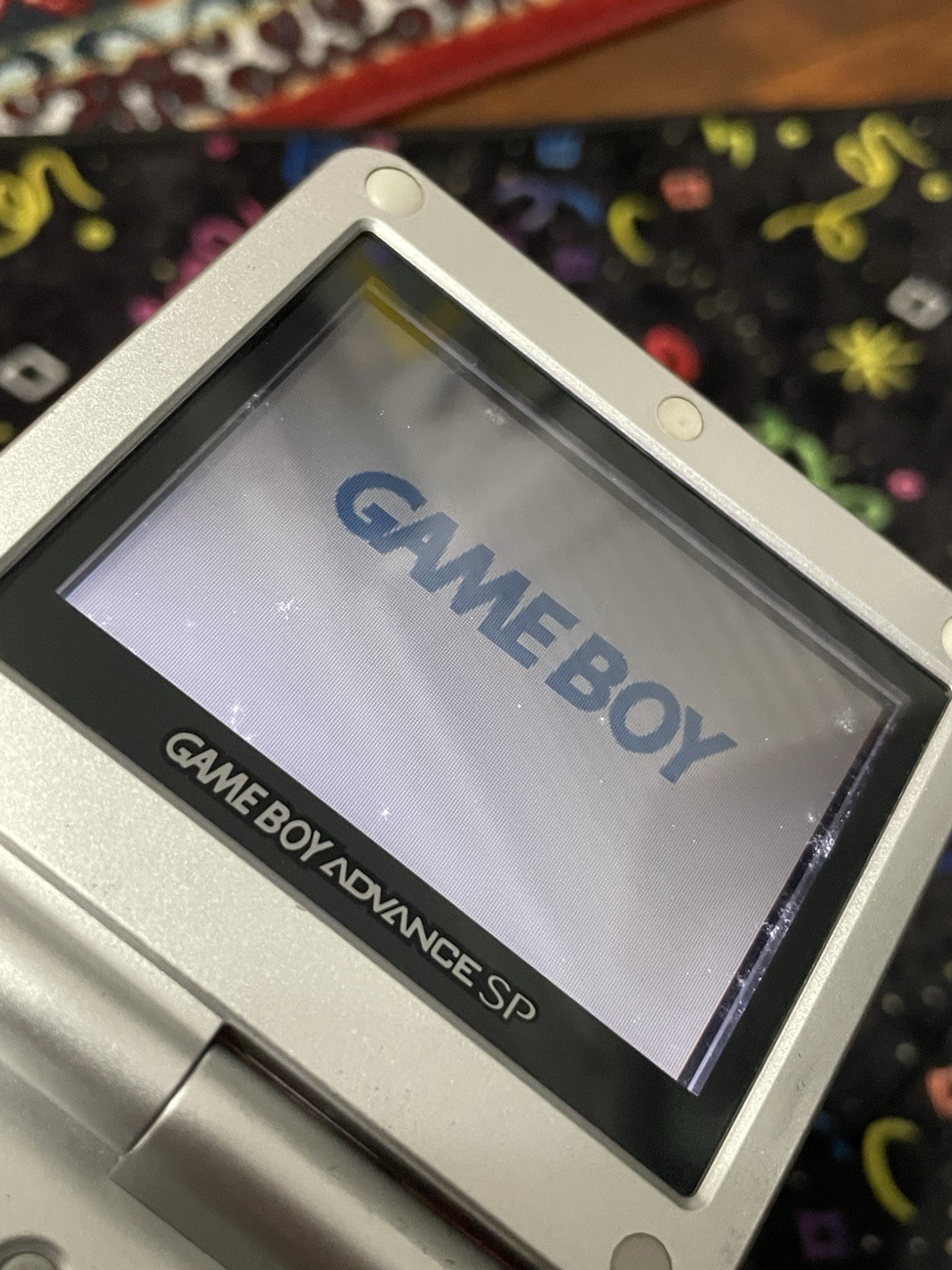 Nintendo Gameboy Advance SP • silver • with carrying case and game