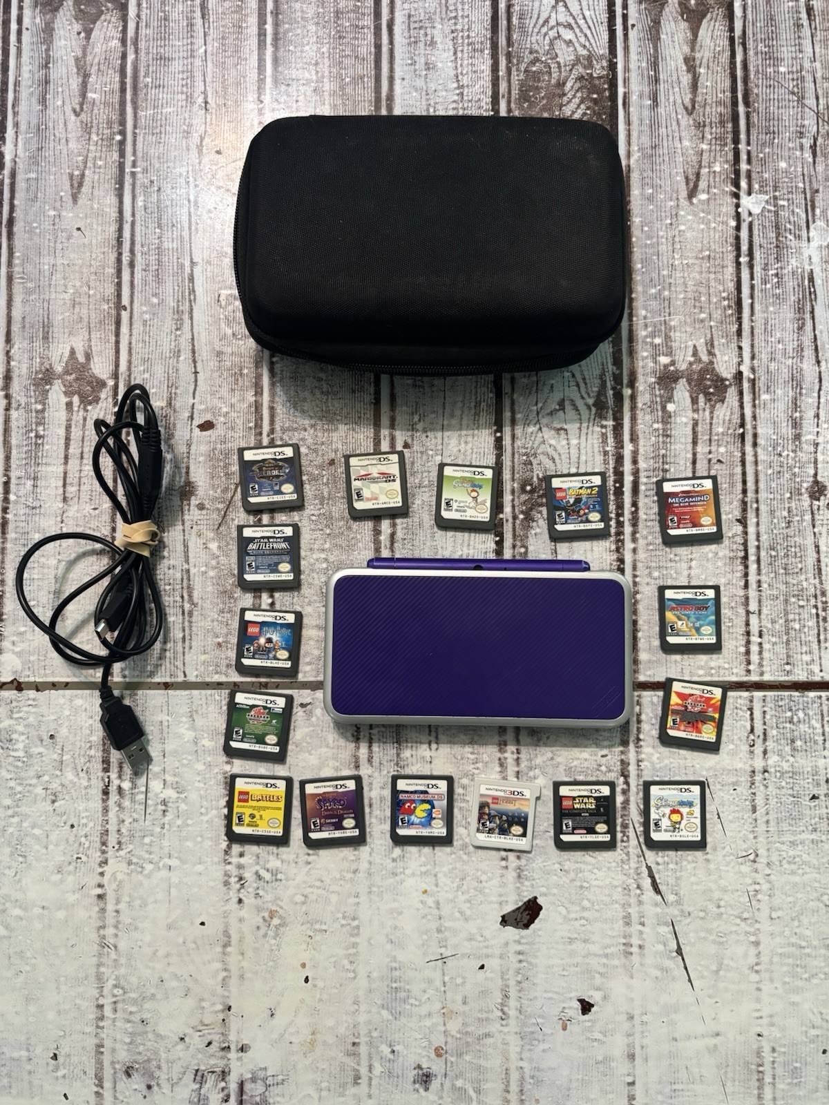 Nintendo “New” 2DS XL Handheld Console (JAN-001) Purple w/Charger + 16 GAMES