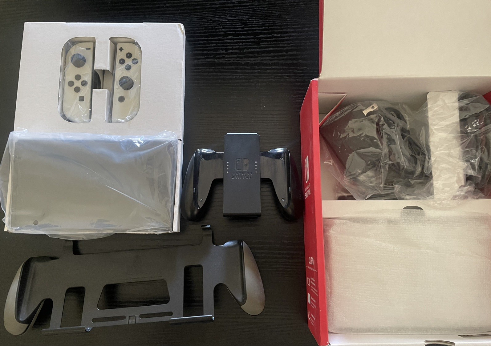 Nintendo Switch OLED with 128GB Micro SD Card, Original Box, & Handheld Grip