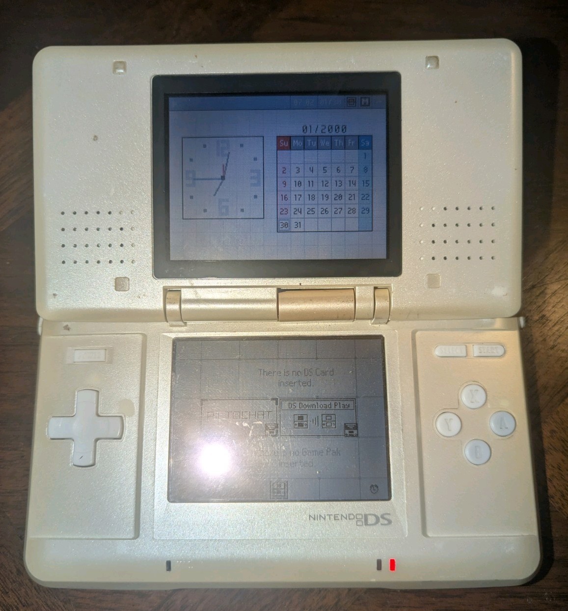 Nintendo DS Handheld Pearl White Model NTR – Turns On Doesn’t Read Games As-Is