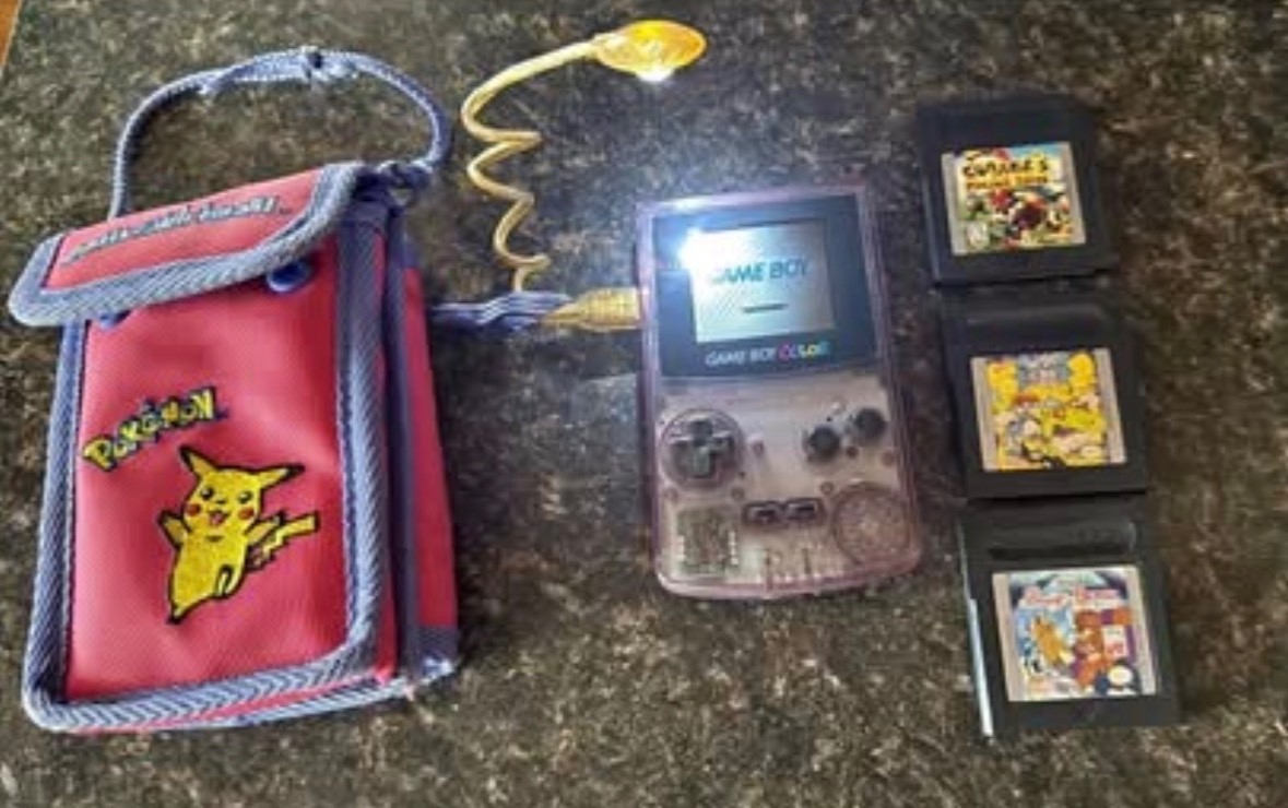 gameboy color in clear lilac purple.. Selling as bundle only