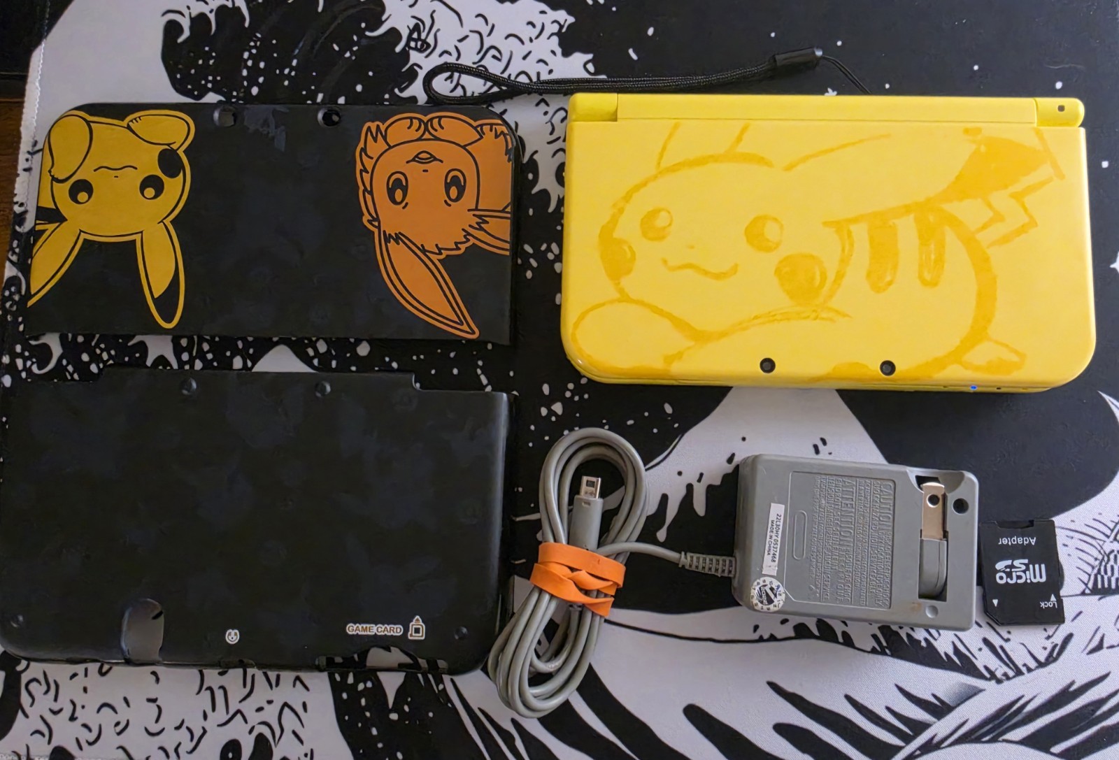 Nintendo New 3DS XL Reshelled Pikachu Edition Includes charger & hard shell