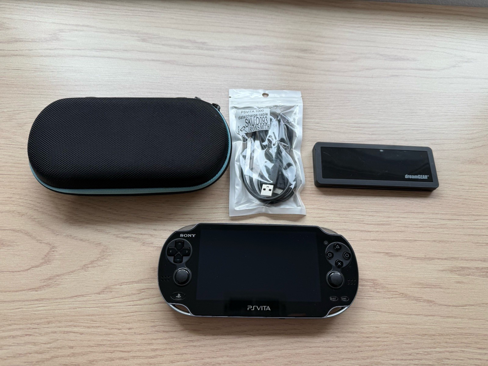 Sony PS Vita PCH-1101 Black Handheld Gaming System W/ Case, 2 SD Cards, & Cord