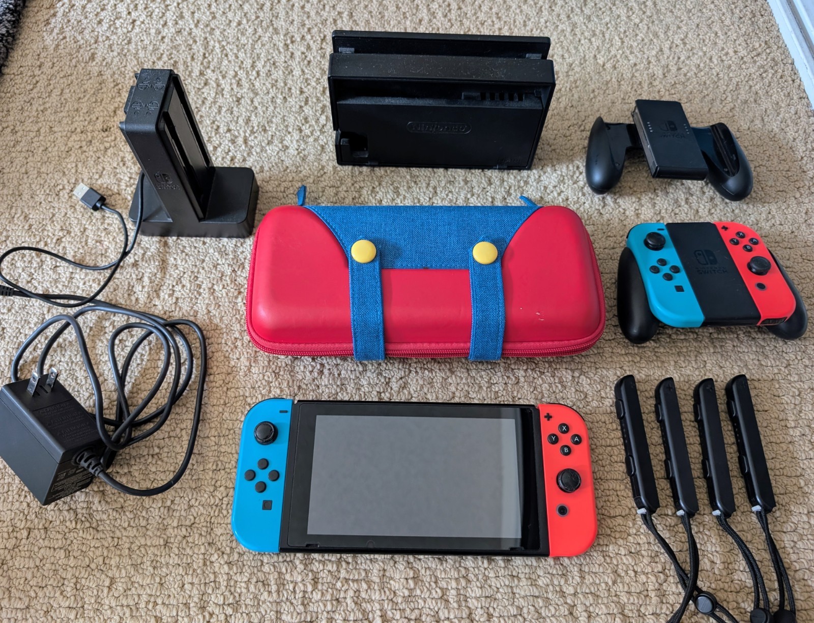 Nintendo Switch 32GB (Red and Blue Joy-Cons) 1st Gen and Accessories Bundle