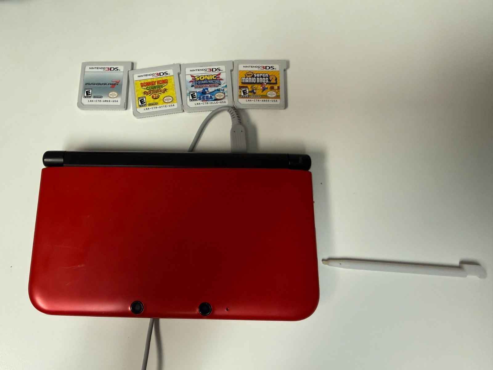 Nintendo 3DS Handheld System – Red plus 4 games