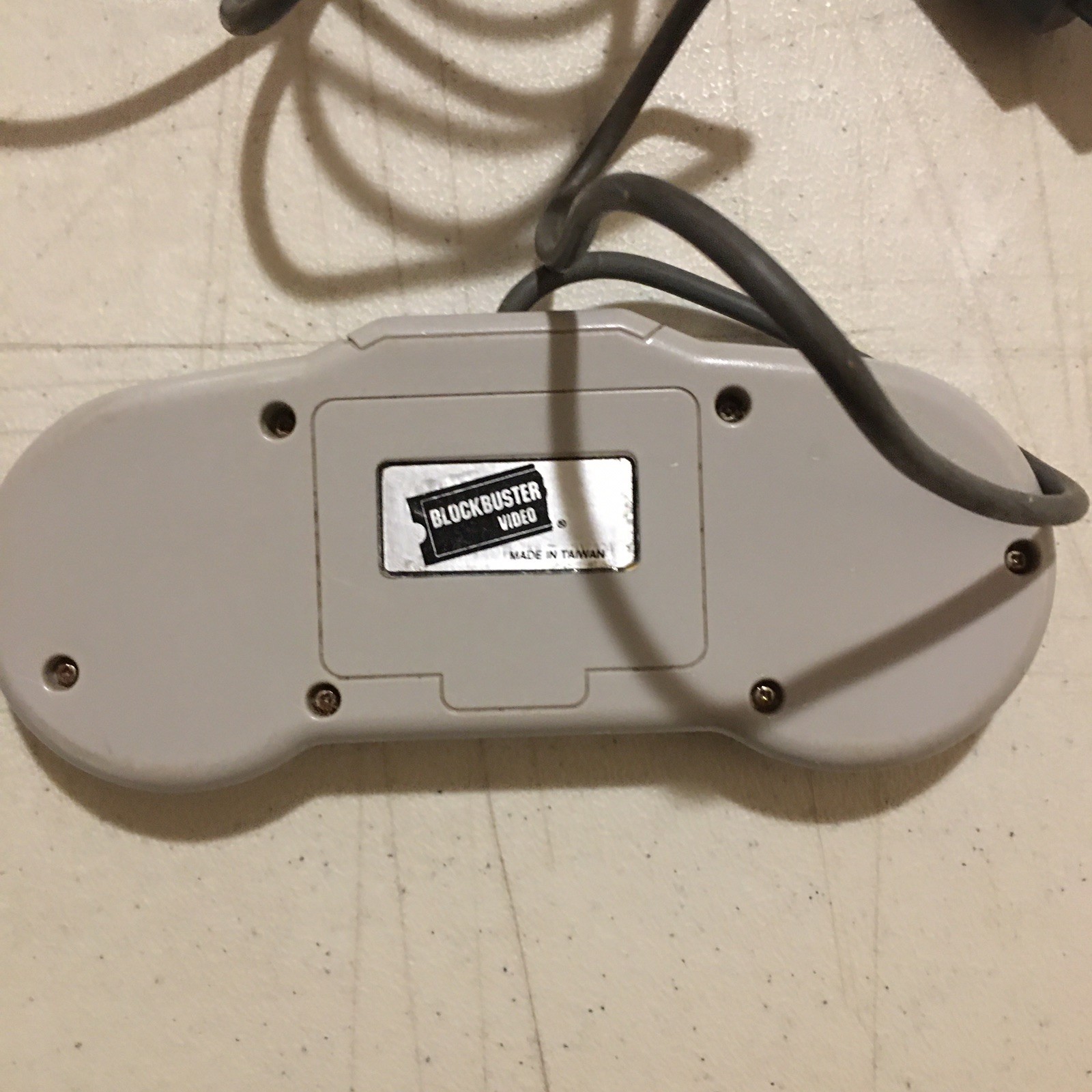 Vintage SNES Super Nintendo Blockbuster Video game console controller 1990s