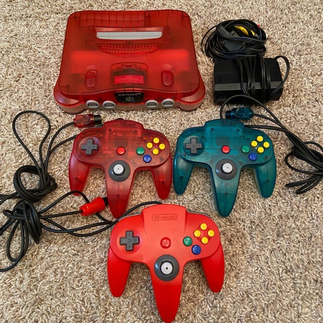 64 Clear Red Console with 3 Controllers and Adapter