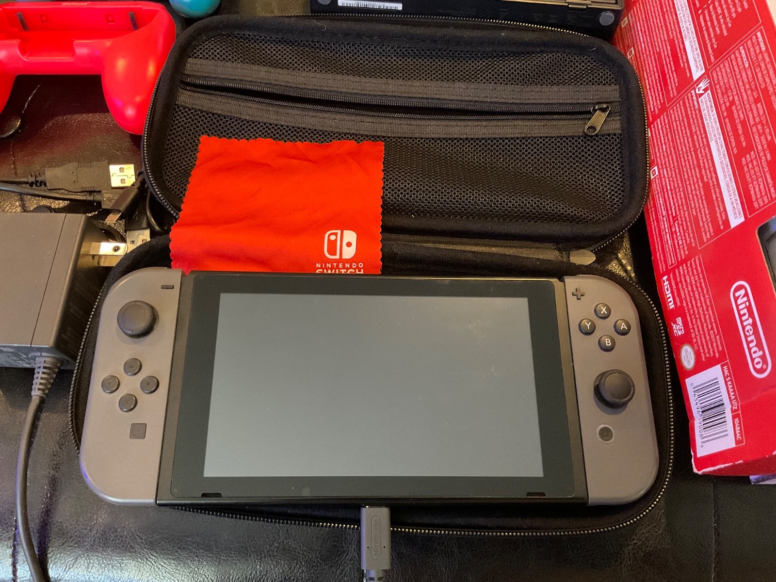 Nintendo Switch 32GB Gray Console with Neon Red and Neon Blue Joy-Con.