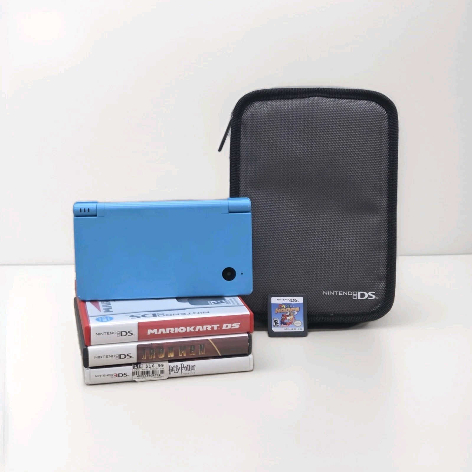 Nintendo DSi Handheld Video Game Console Light Blue TWL-001 (USA) W/ 4 Game LOT
