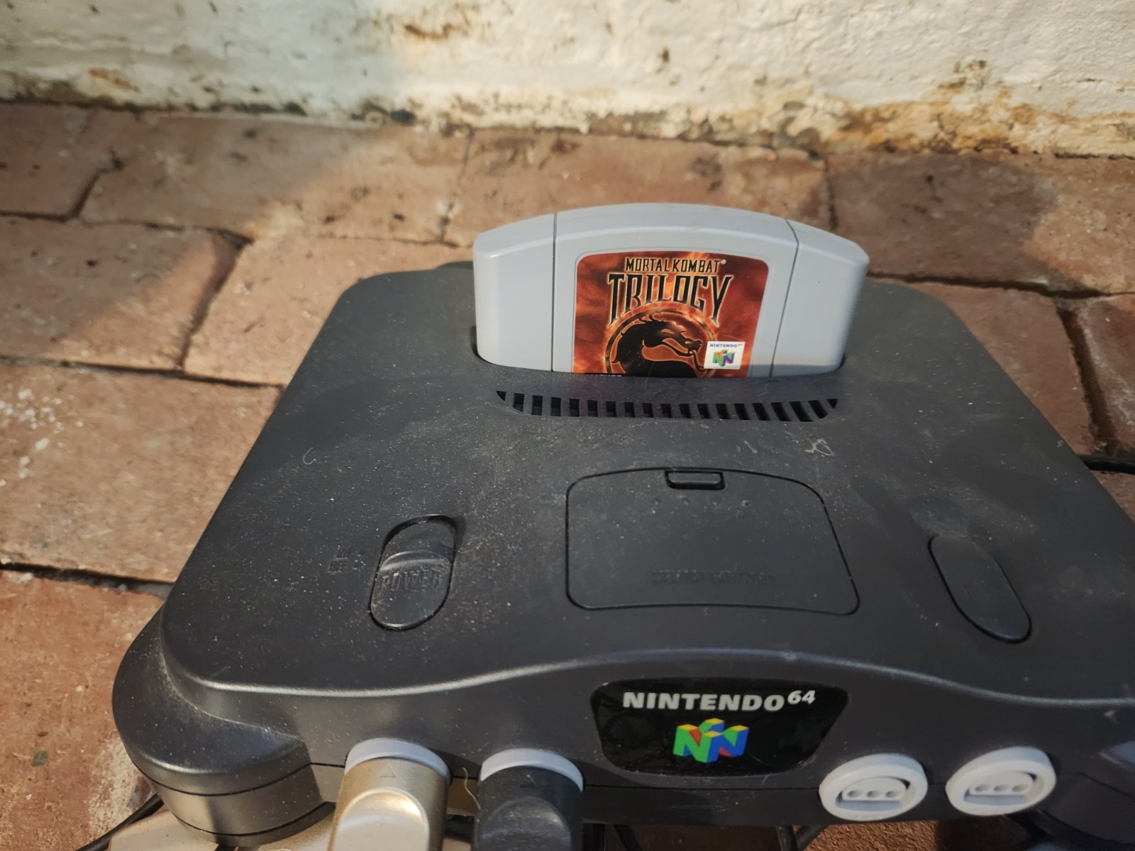 Nintendo 64 Home Console – Black with Mortal Kombat Trilogy cartridge