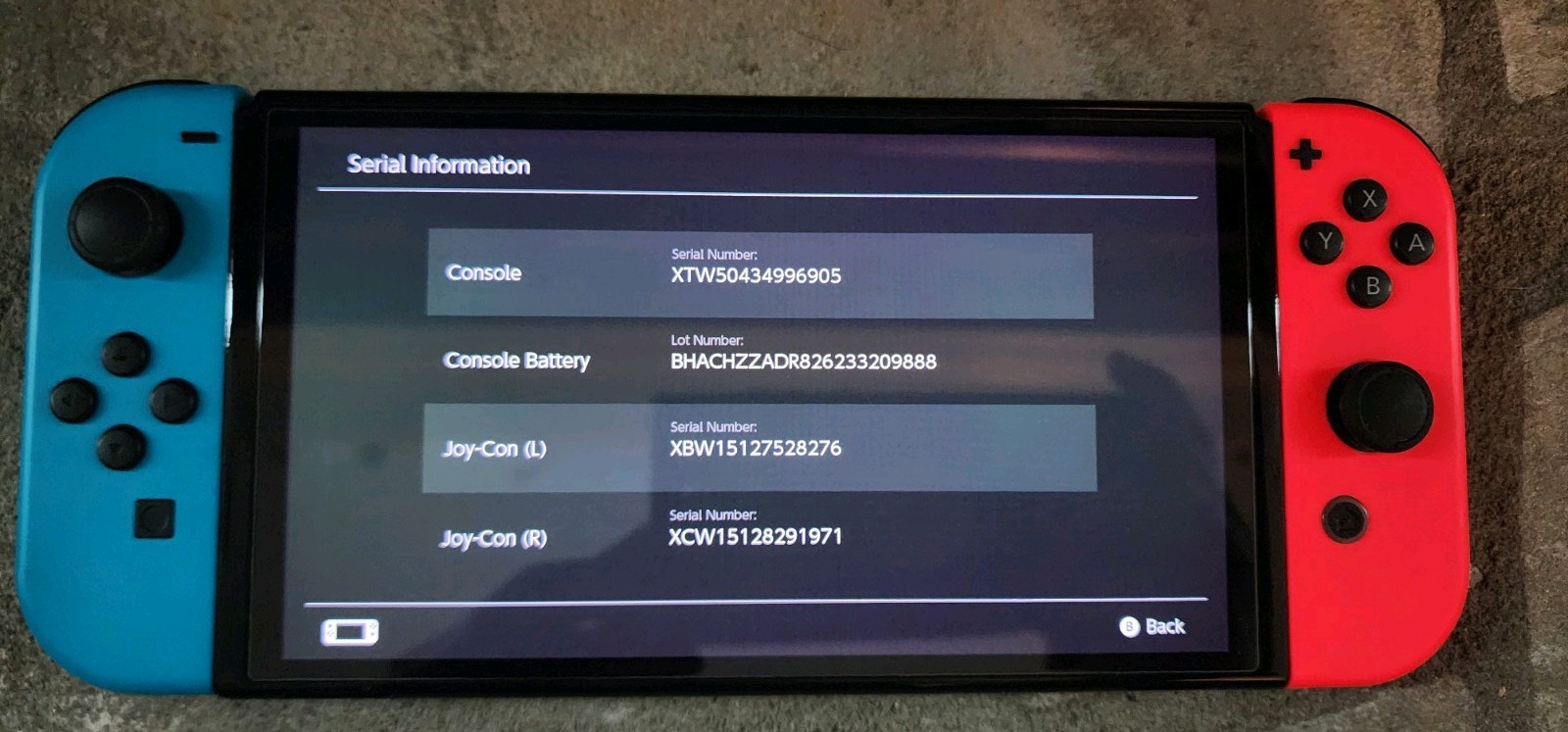 Blue and Red Nintendo Switch OLED – comes wirh 128gb SD card