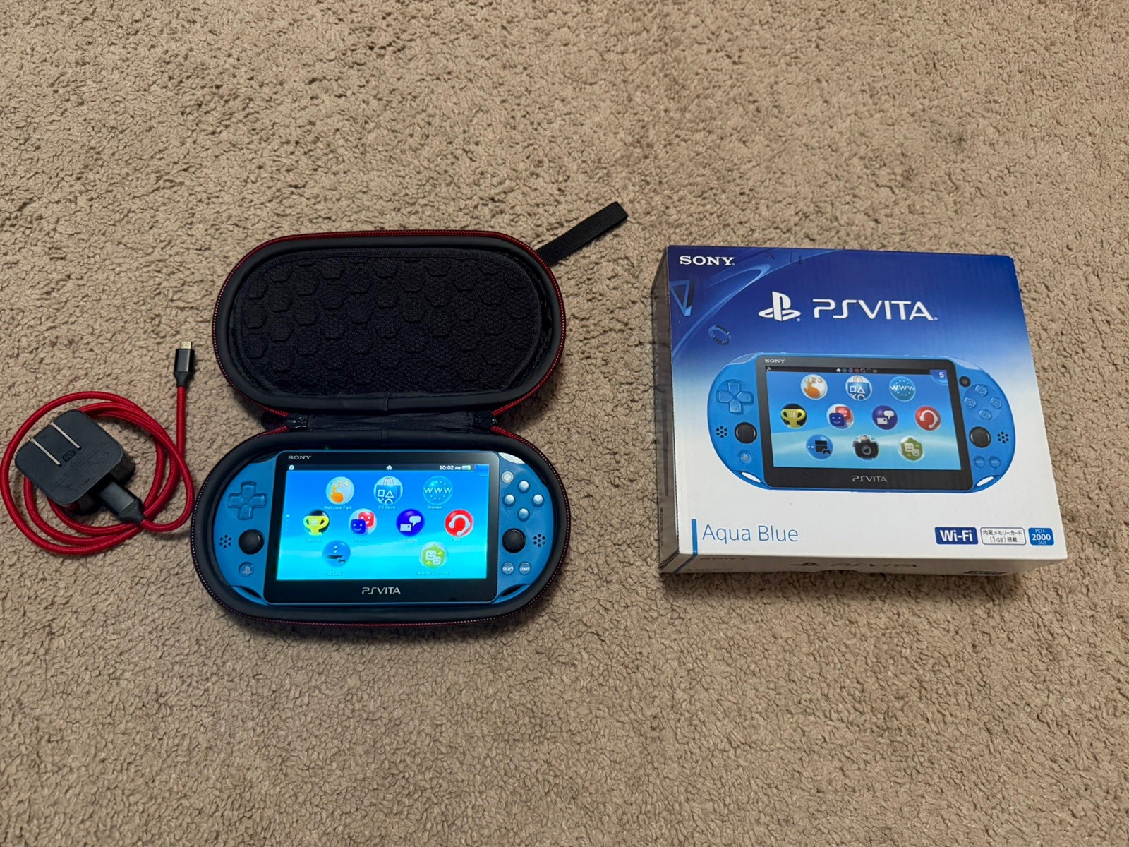 Sony PlayStation Vita 16GB – Aqua Blue (PCH-2000ZA23) with 64gb memory card