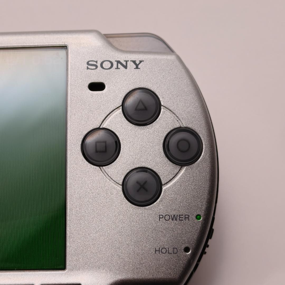 Sony PSP 2000 Crisis Core: Final Fantasy VII Bundle 64MB Silver Handheld System