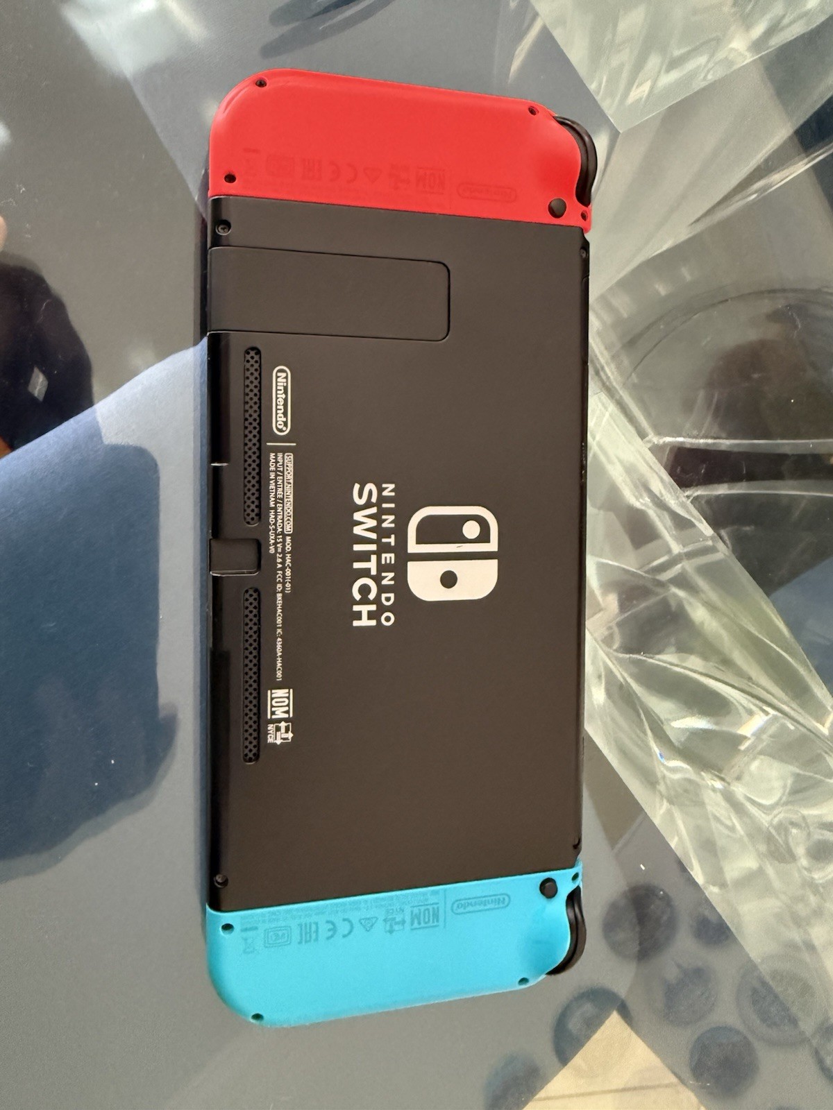 Nintendo Switch HAC-001 Console w/ Dock, Red/Blue Joy-Con & Controller Grip