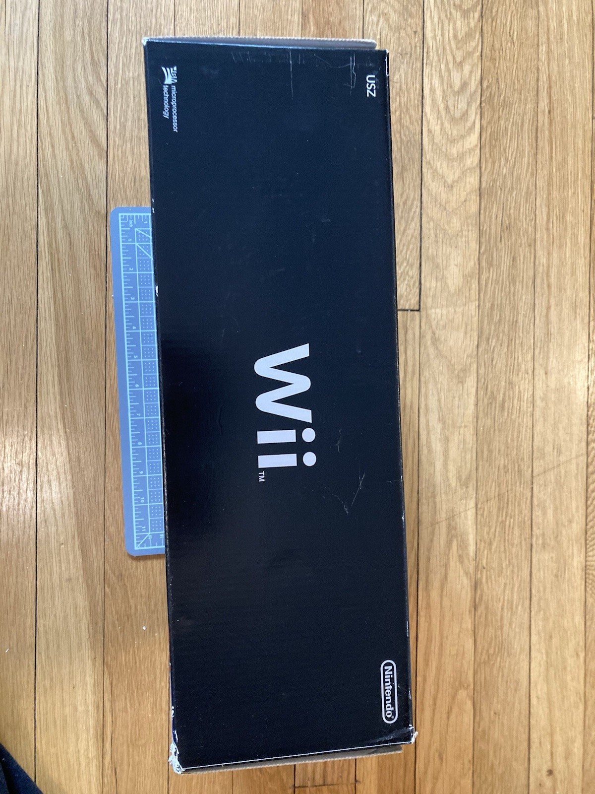 NEW Black Nintendo Wii Open box, includes Super Mario Bros. Wii