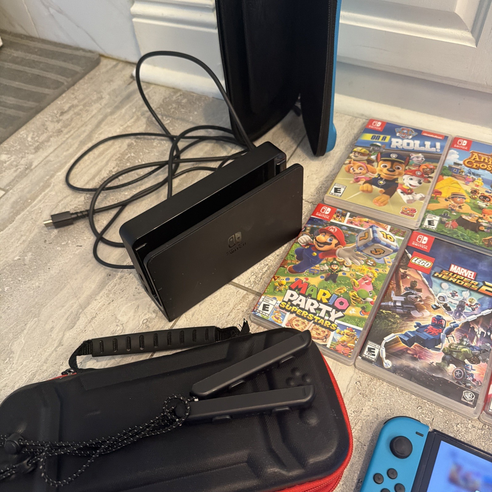 Nintendo Switch OLED BUNDLE 64GB 10 games w 5 Mario games & Comes w/ attachments