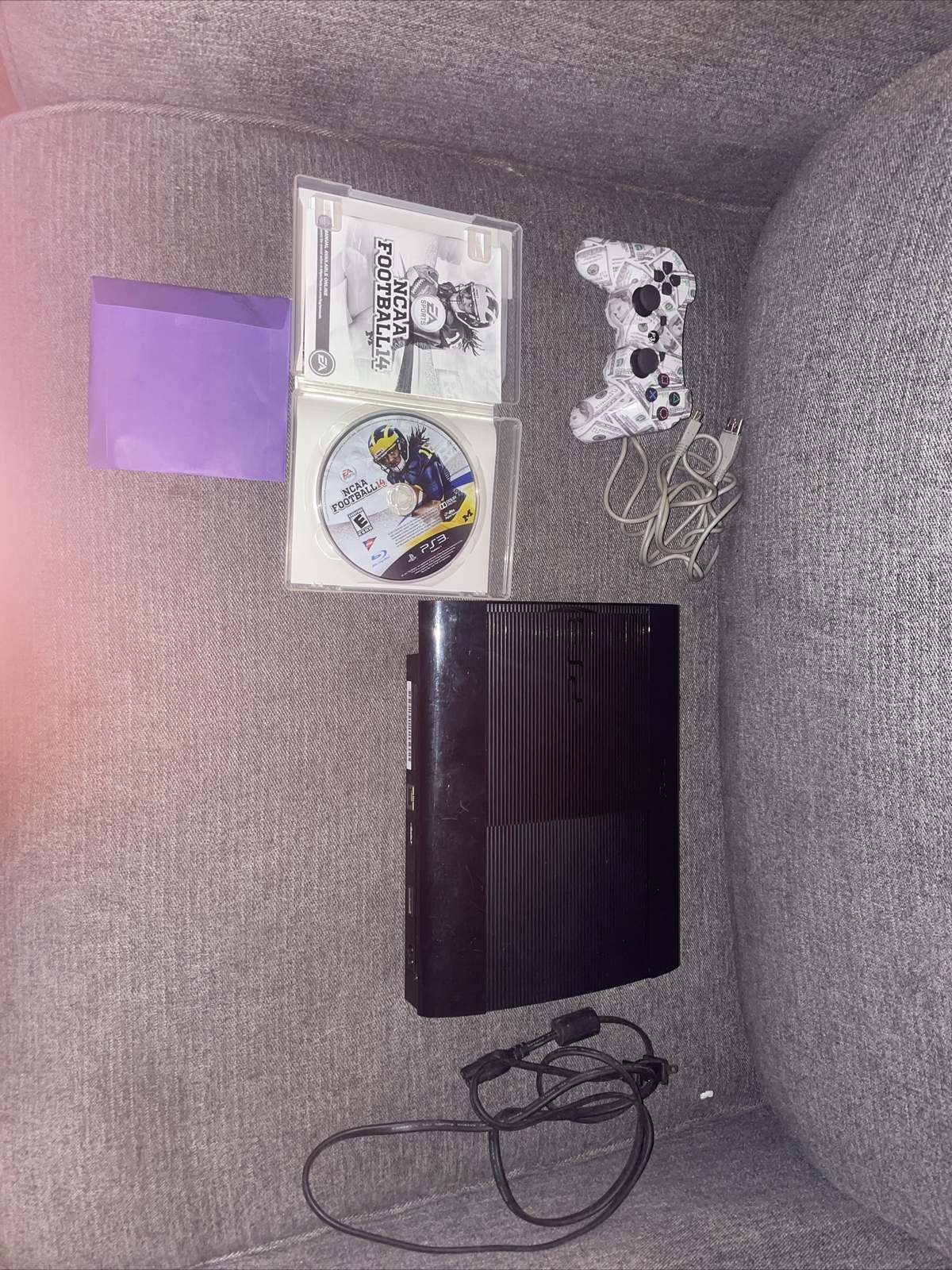 Sony PlayStation 3 250GB Console – Black With NCAA Football 14