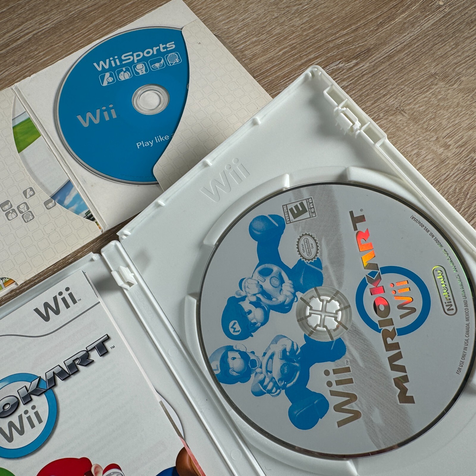 Nintendo Wii Console Mario Kart Bundle with Wii Sports, 2 Controllers & 2 Wheels