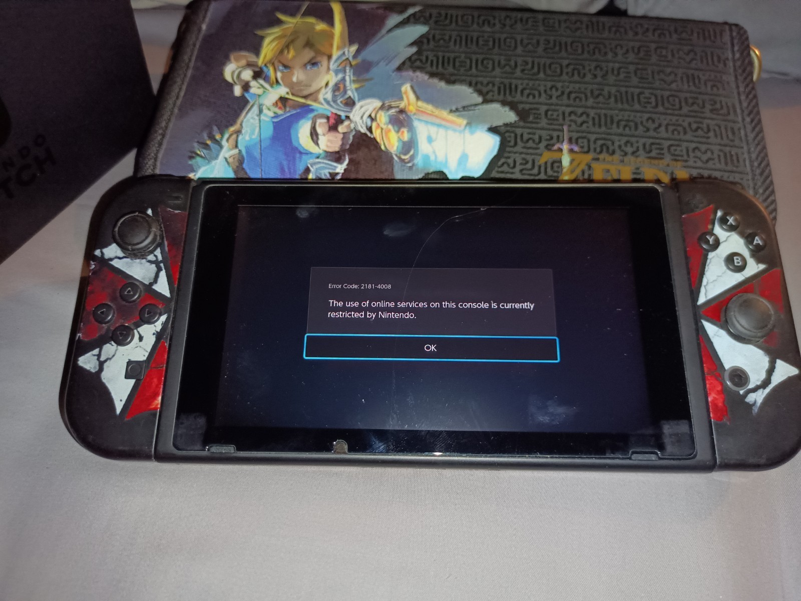 Nintendo Switch +32GB Gray Console with Resident Evil Joy Cons & Extras)