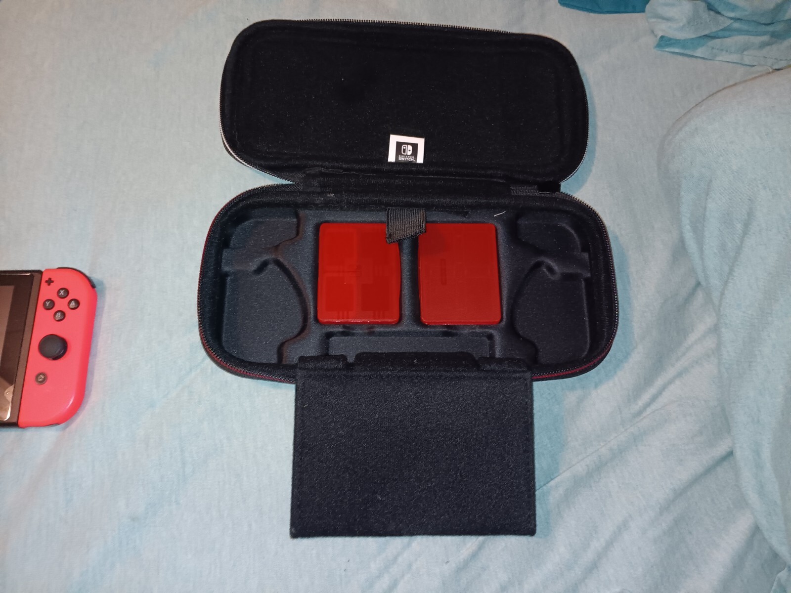 Nintendo Switch. Blue and red controller.