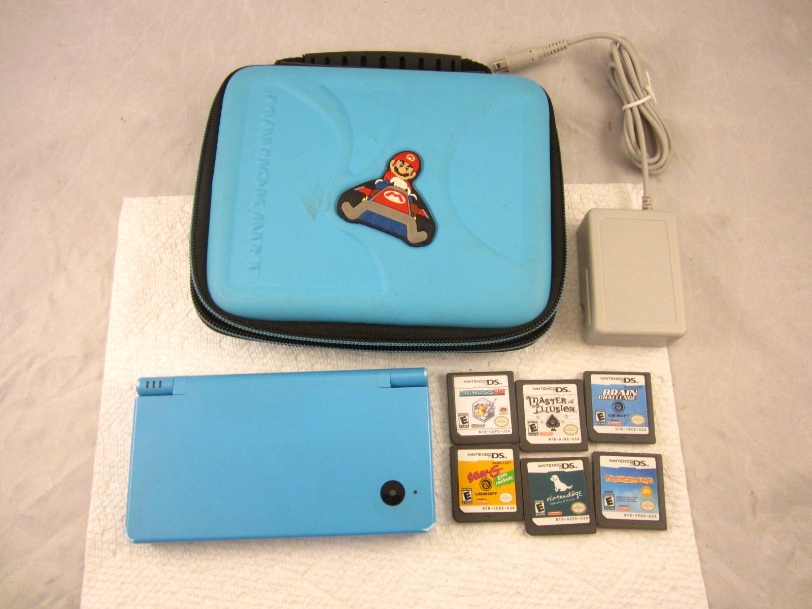 Nintendo DSi Blue Console Bundle 6 Games Storage Case Stylus Tested Charger