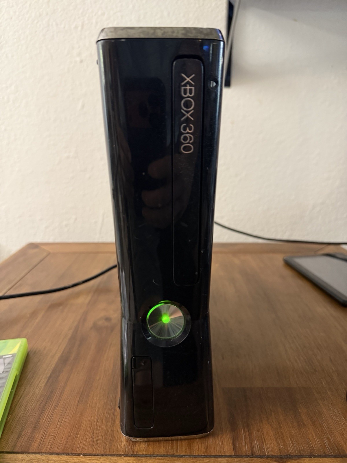 Xbox 360 Slim 250GB glossy black. Tested W power cord and 46 games on hard drive