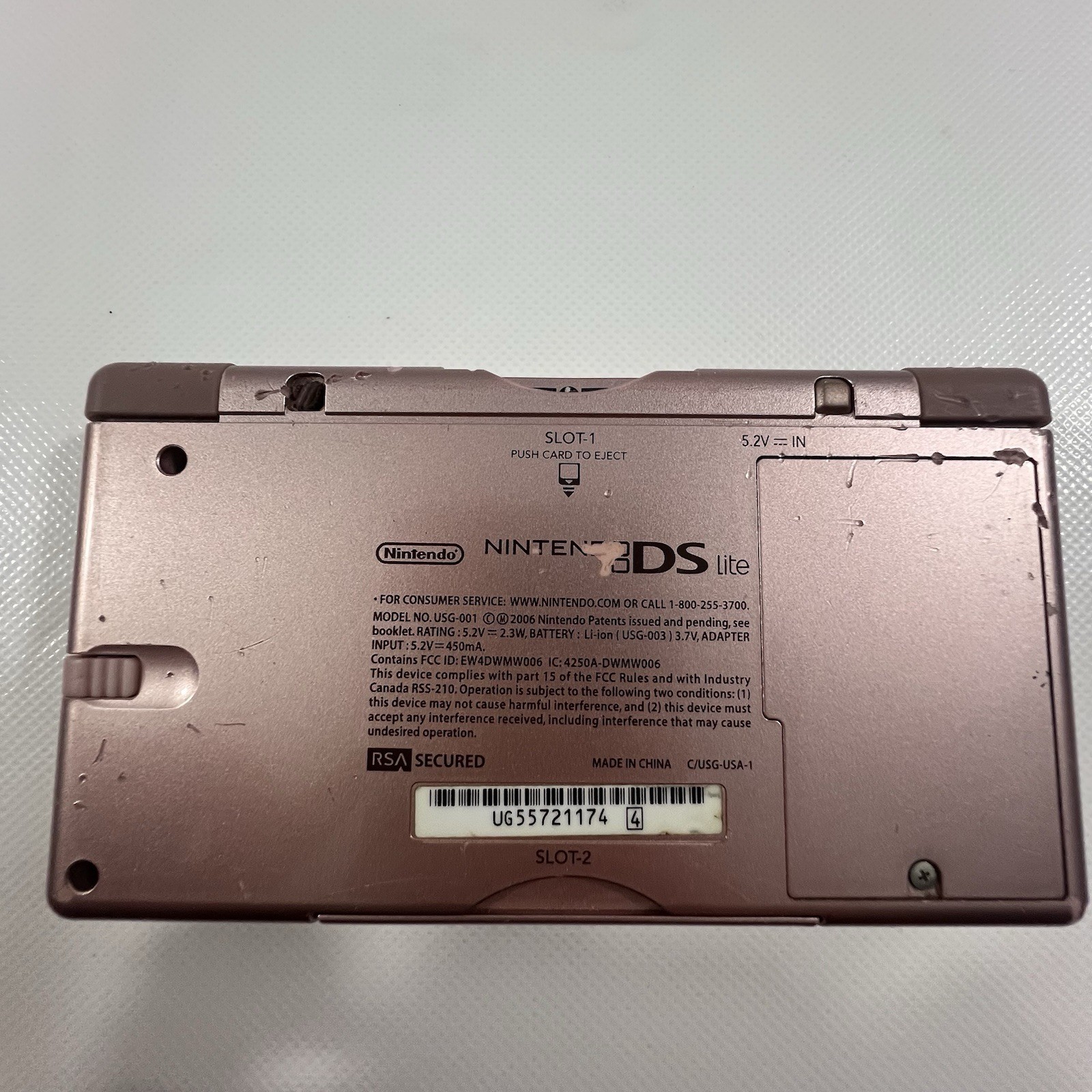Nintendo DS Lite Handheld Console with Stylus and Wall Charger Has Bite Marks