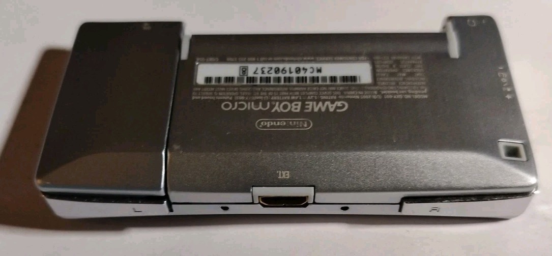 Nintendo Game Boy Micro GBA (Working) with Cracked Faceplate & 3rd-Party Charger