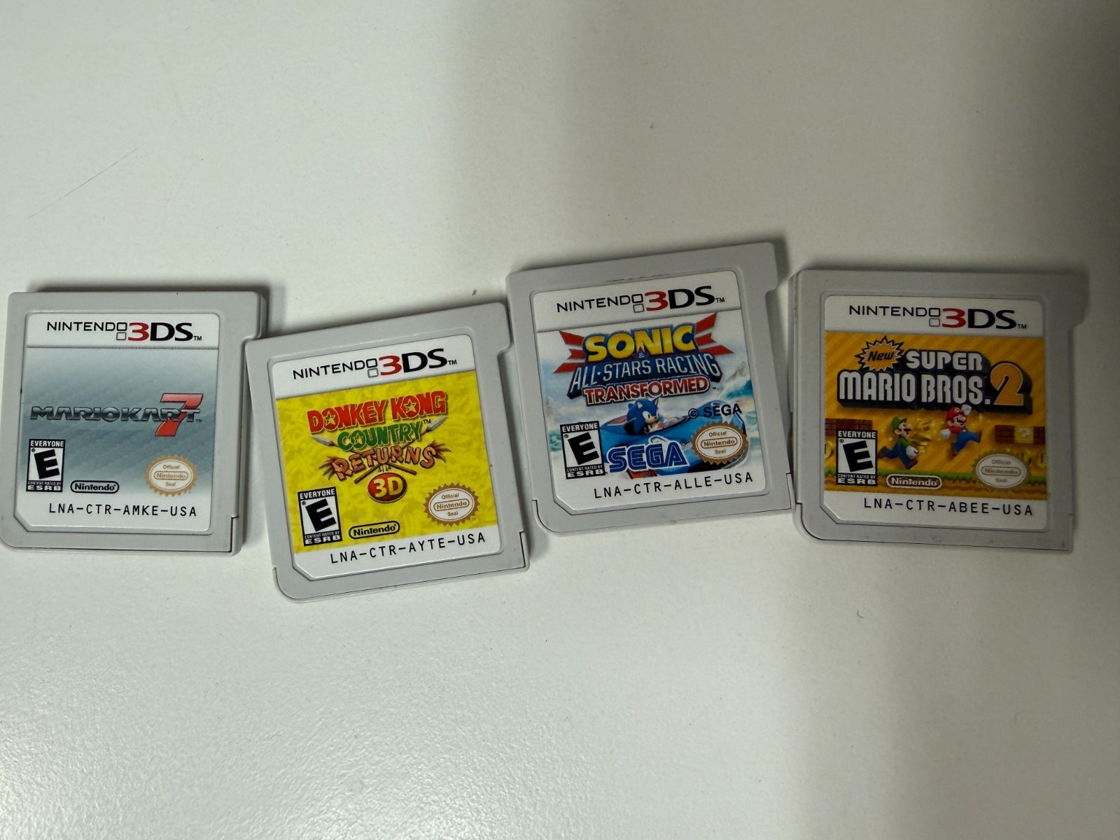 Nintendo 3DS Handheld System – Red plus 4 games