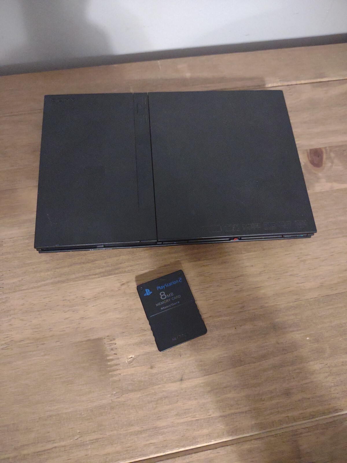 Sony PlayStation 2 Slim Line Version 1 Console – Charcoal Black (SCPH-70012)&8MB