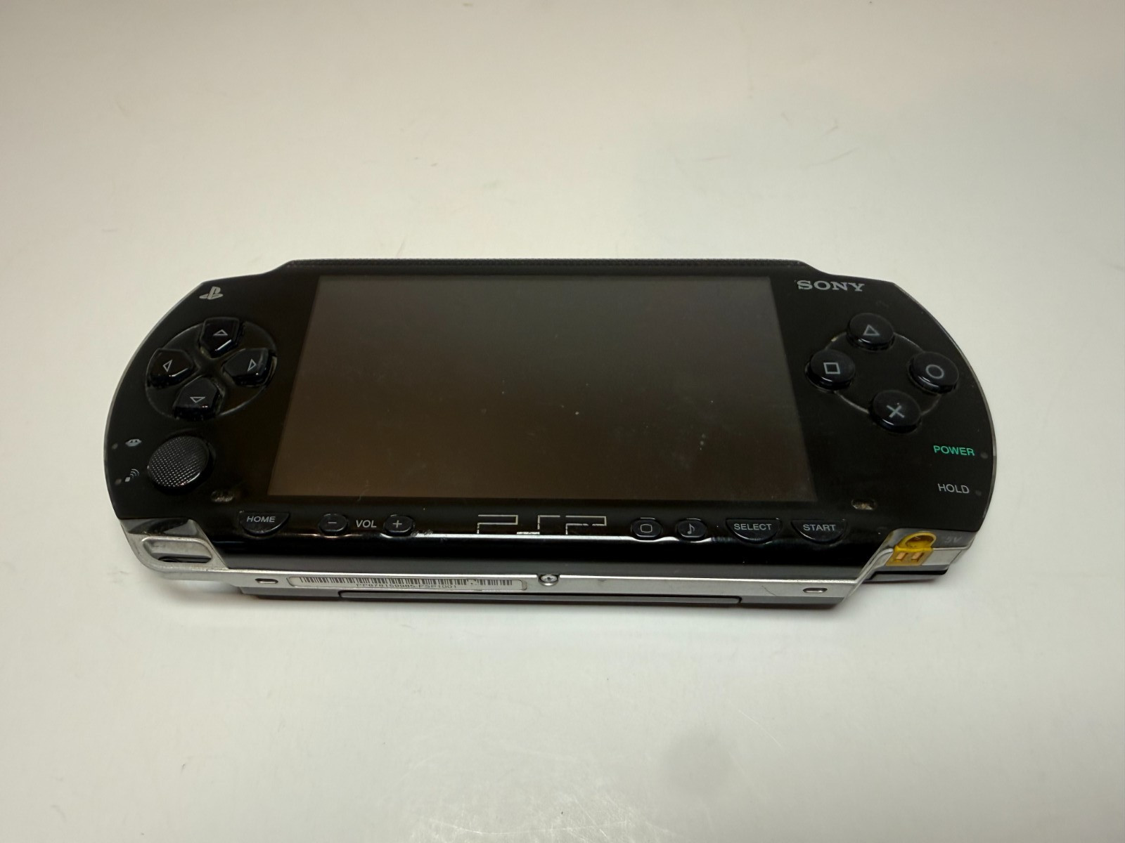 Sony PSP PSP-1001 handheld game console being sold FOR PARTS OR REPAIR.
