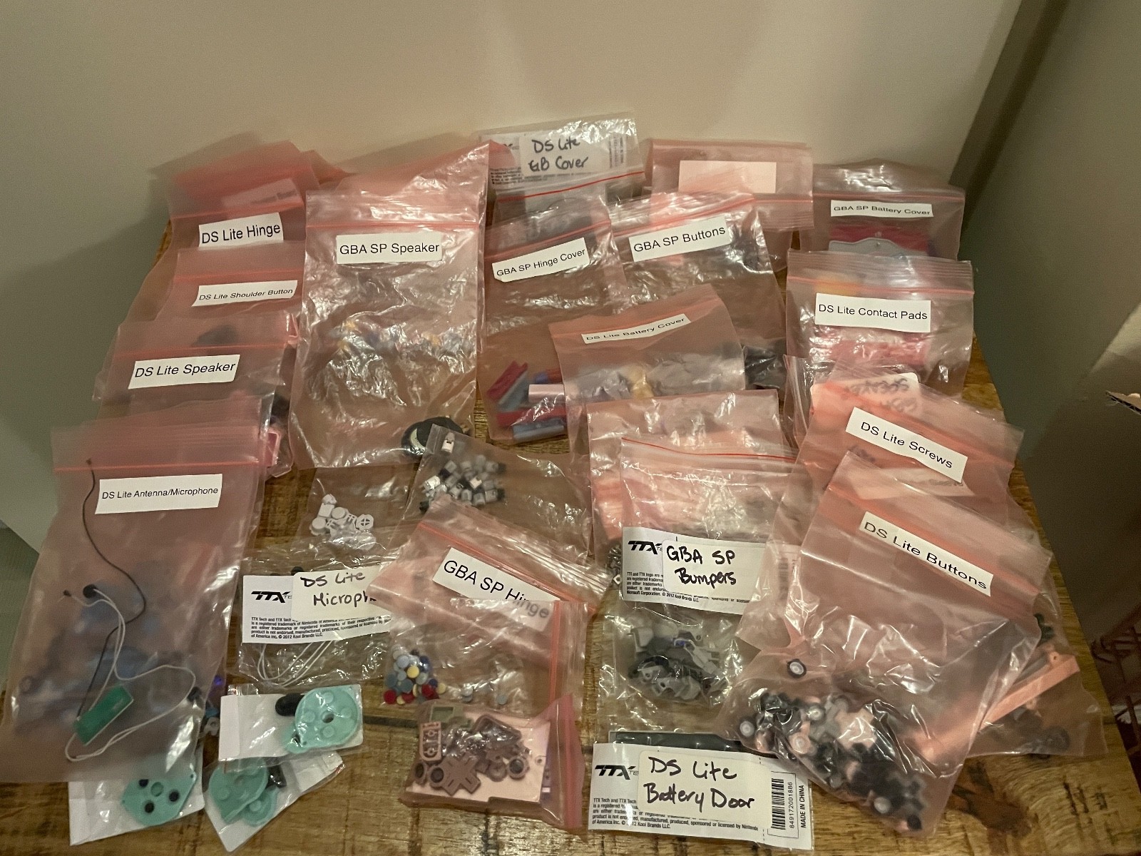 Nintendo DS Lite – Repair & Parts Lot Misc buttons, covers, speakers, and more