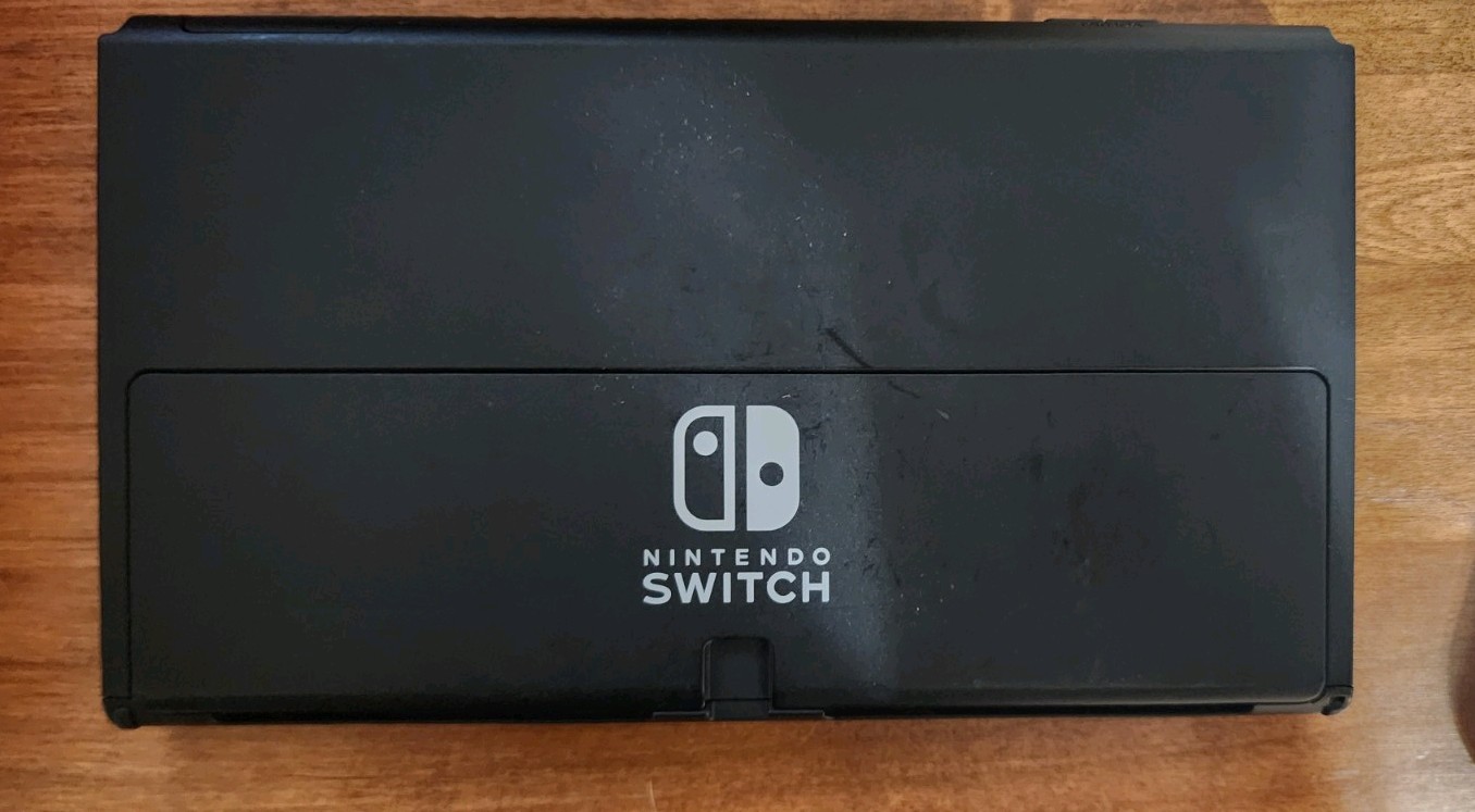 Blue and Red Nintendo Switch OLED – comes wirh 128gb SD card