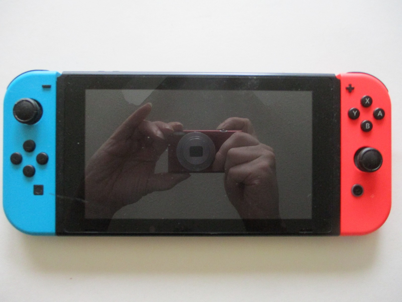 Nintendo Switch Red and Blue Console +1 Game