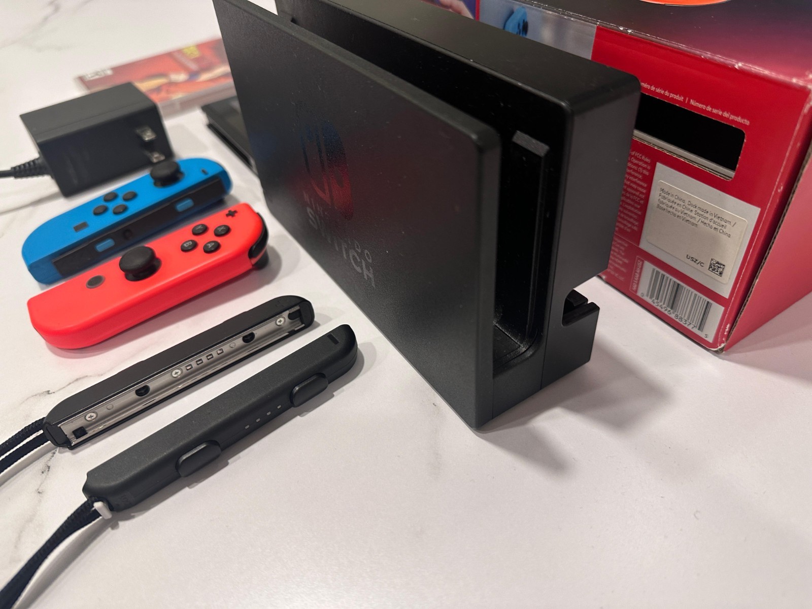 Nintendo Switch 32GB Black Console with Neon Red and Neon Blue Joy-Con