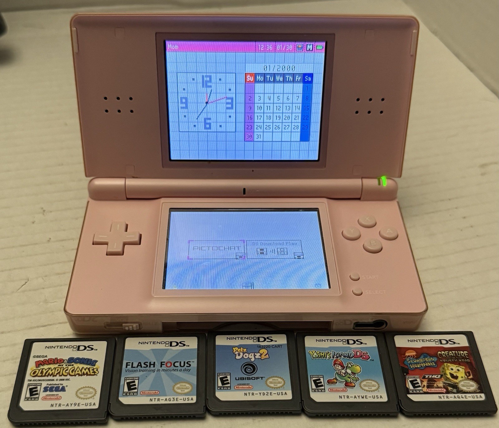 Nintendo DS Lite Handheld Console with Stylus & Games – Coral Pink – Tested