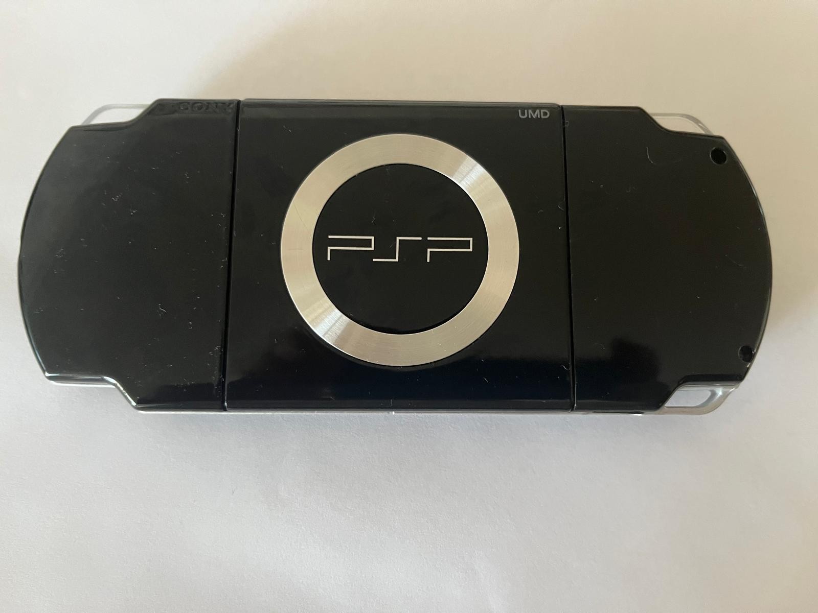 Sony PSP-3000 Launch Edition 64MB Piano Black Handheld Systemn Prealoaded games.