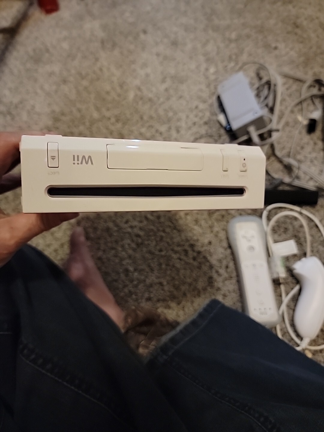 Wii Console,1 controller&Nun Chck,wii Fit Brd,7 games, plug, sensor bar & Manual