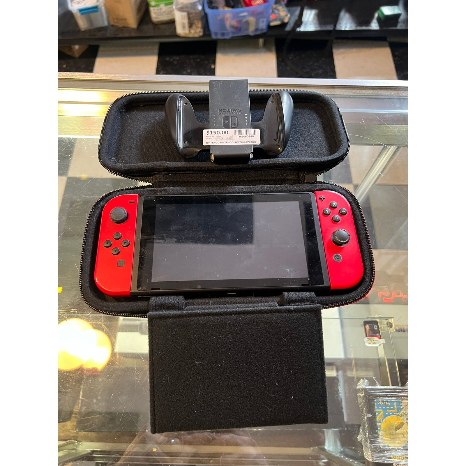 Nintendo Switch with Case and JoyCon Controller Holder