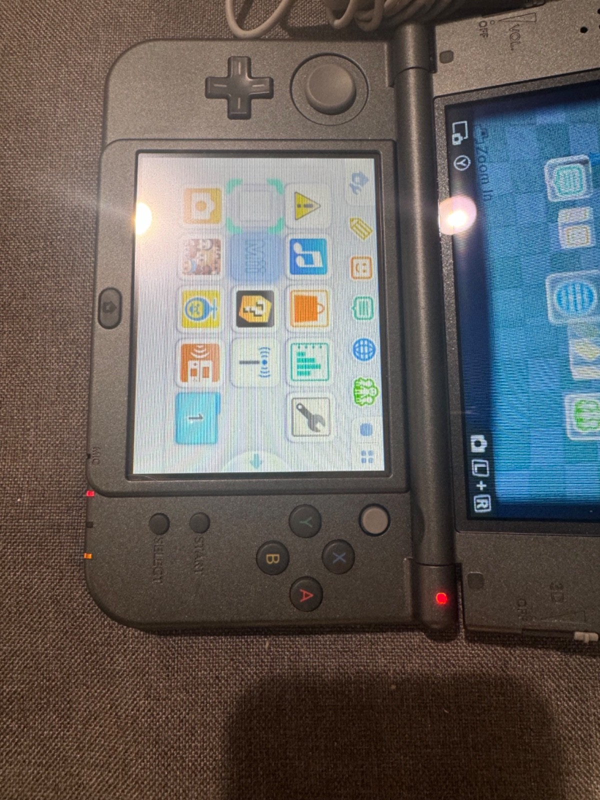 Nintendo 3DS XL Metallic Black with charger and 5 games great condition