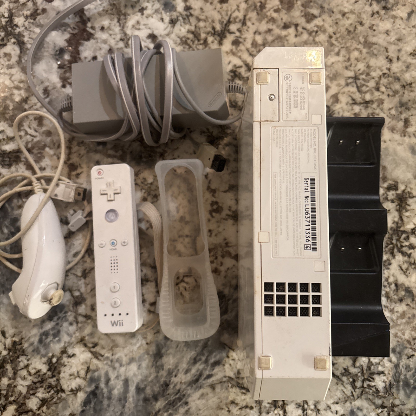 White Wiii Console with 2 Controllers. power corD & RCA