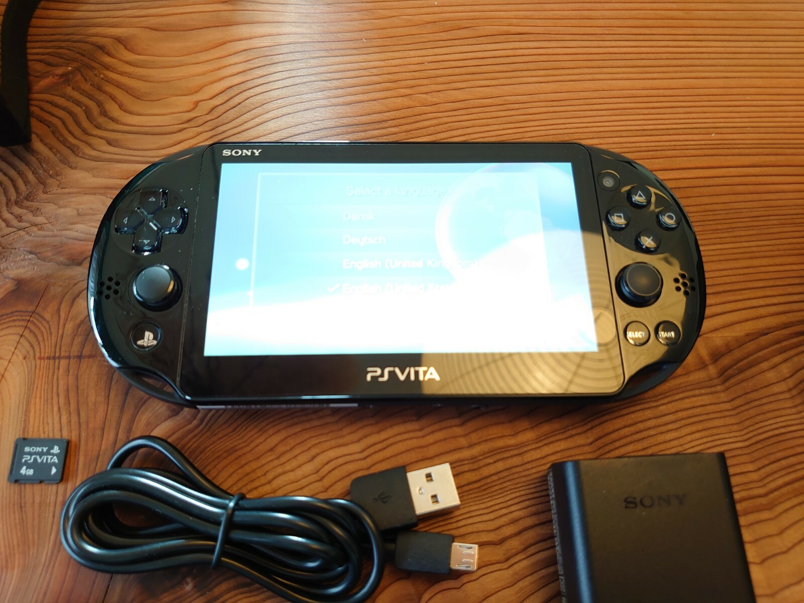 Sony PS Vita PCH-2000 ZA11 slim Black Console with Charger, 4GB memory, Pouch