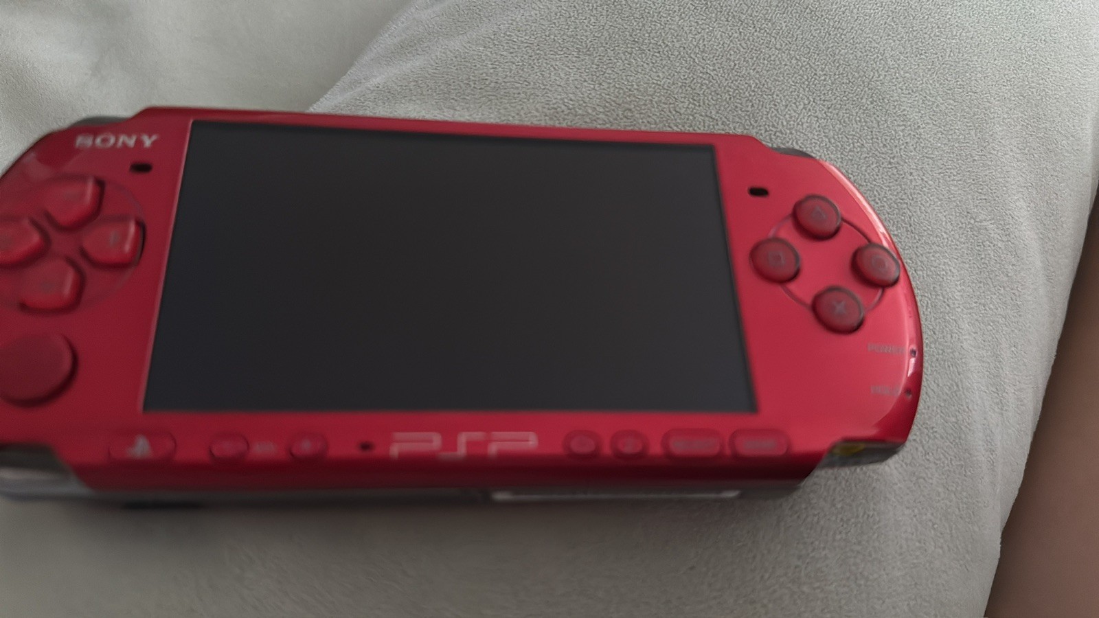 Sony PSP-3000 Radiant Red Handheld System running custom software
