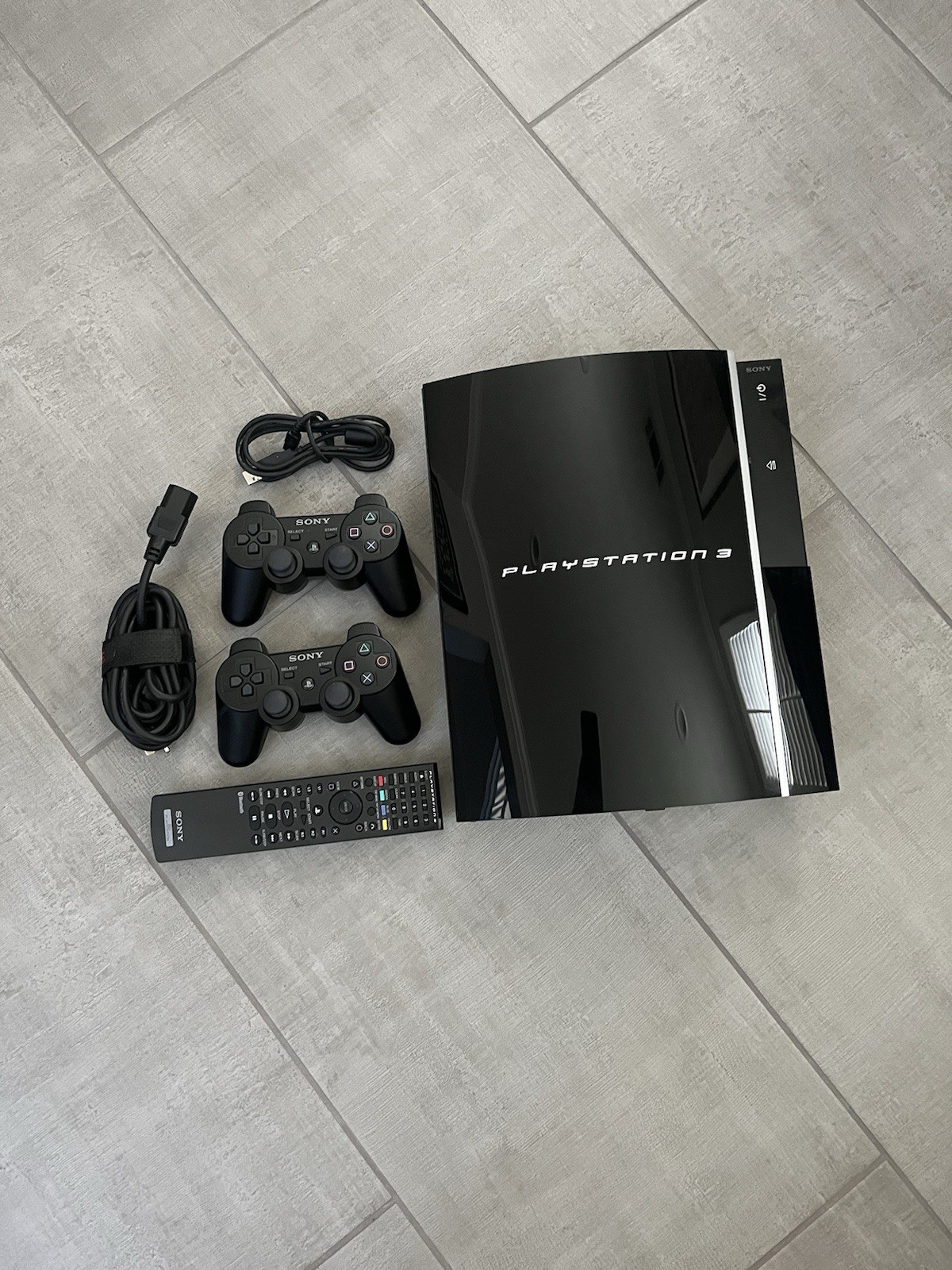 Sony PlayStation 3 Black Fat Includes 2 Controllers, Remote, And Cords- Tested