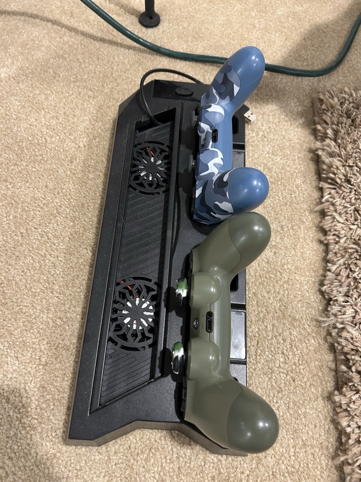 PlayStation 4 Slim with 2 controllers + charging stand/fan system and 3 games