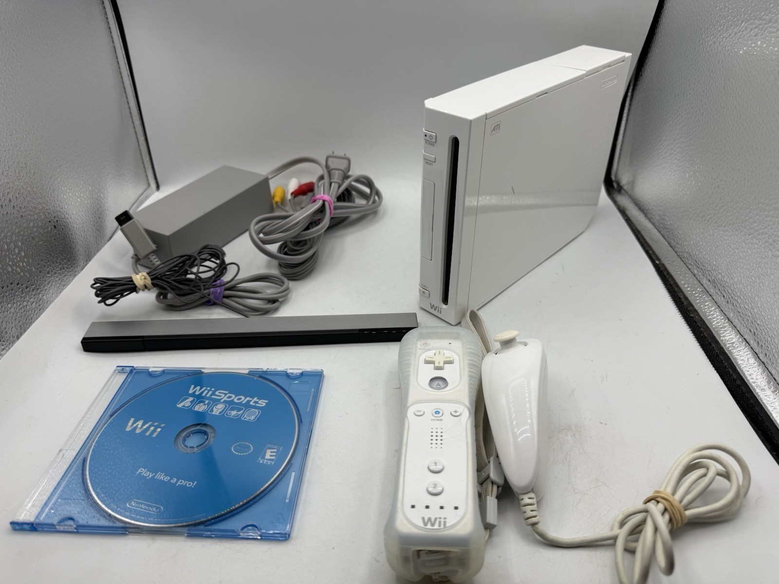 Complete Nintendo Wii Console Bundle with Wii Sports, Controller, Nunchuck White