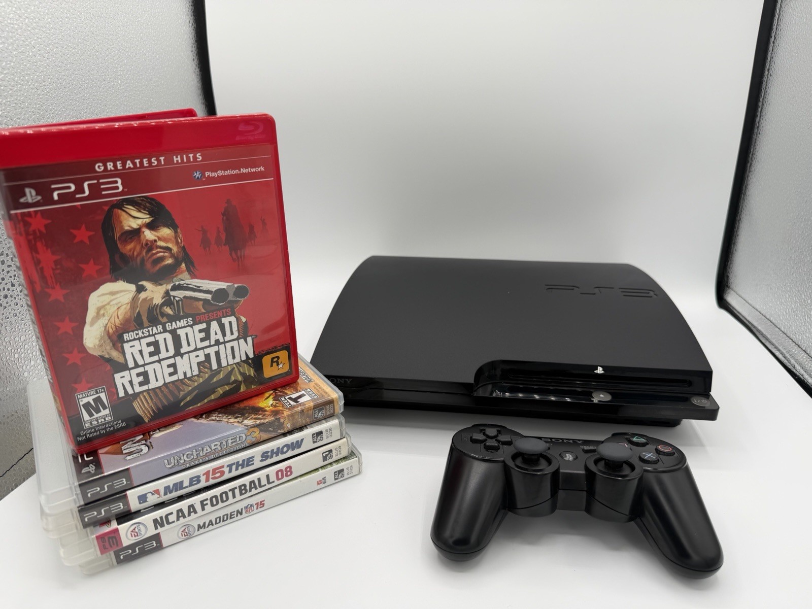 Sony PS3 Slim 120GB SSD Refurbished Bundle CECH-2001A – OEM Controller 5 Games